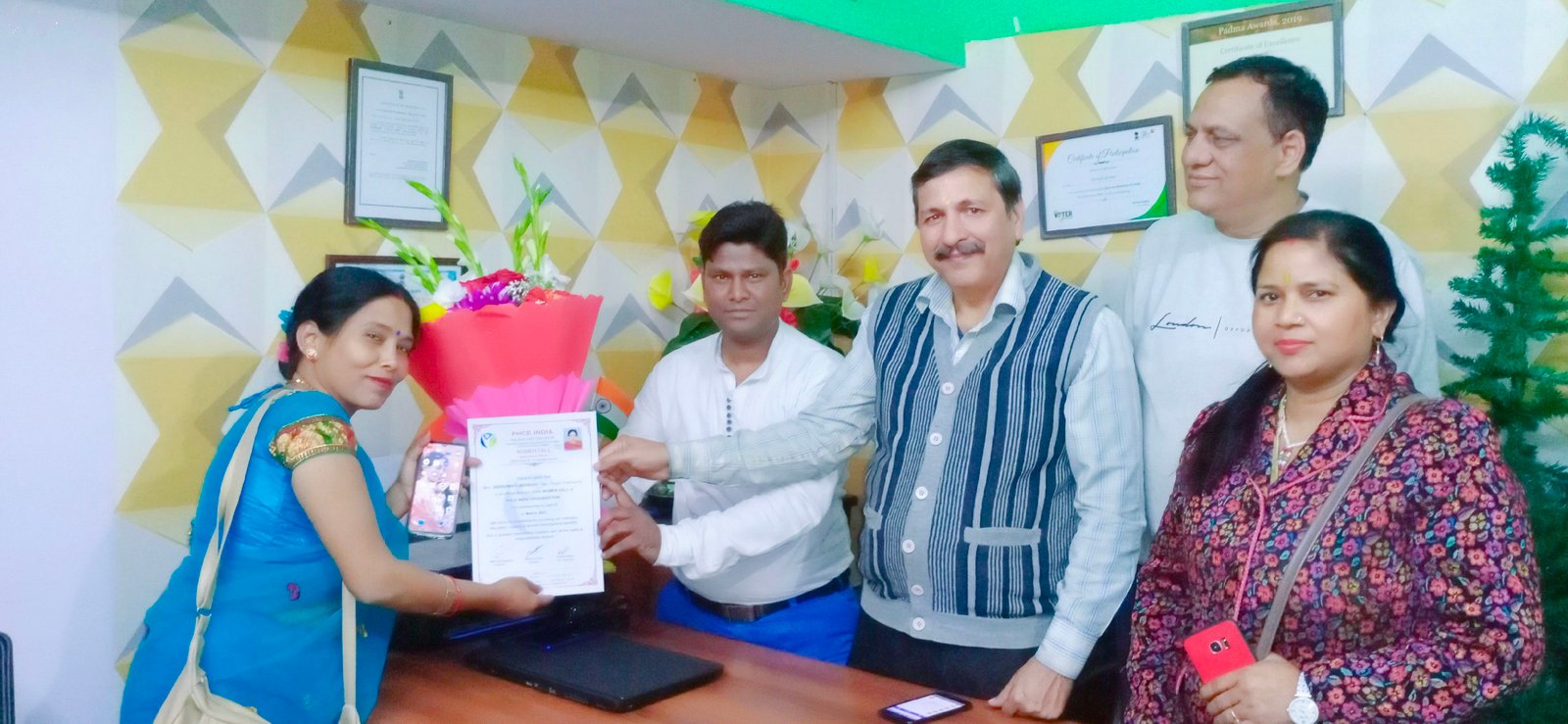 Mr. Mahender Agarwal, President of the Nehru Place Market, extending his greetings from a distance.
